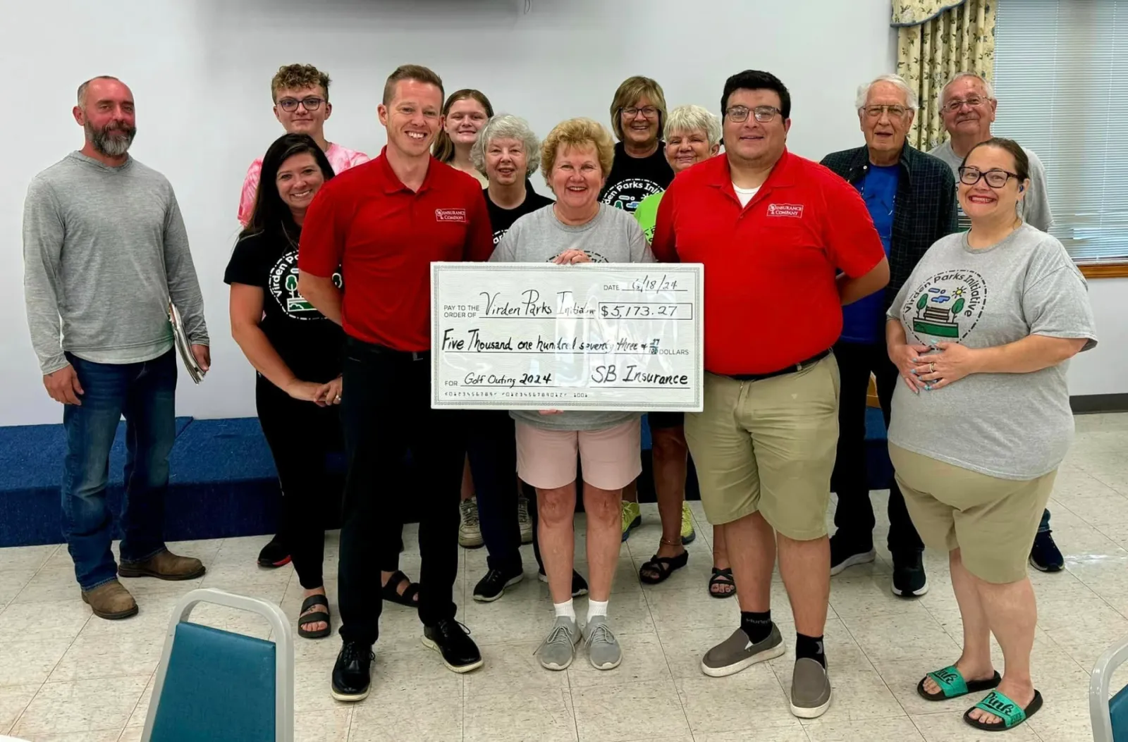 SB Insurance presenting a donation at the Virden Parks Initiative golf outing