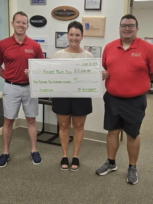 SB Insurance presenting a donation to Project Third Day